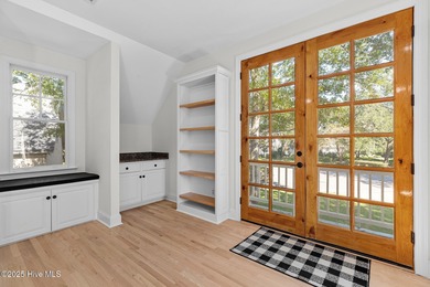 This beautifully renovated home sits along the Ocean #5 fairway on Country Club of Landfall in North Carolina - for sale on GolfHomes.com, golf home, golf lot