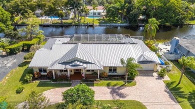 Unique Key West-style waterfront retreat in prestigious Golf on Plantation Preserve Golf Course in Florida - for sale on GolfHomes.com, golf home, golf lot