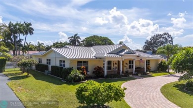 Unique Key West-style waterfront retreat in prestigious Golf on Plantation Preserve Golf Course in Florida - for sale on GolfHomes.com, golf home, golf lot