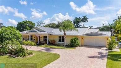 Unique Key West-style waterfront retreat in prestigious Golf on Plantation Preserve Golf Course in Florida - for sale on GolfHomes.com, golf home, golf lot
