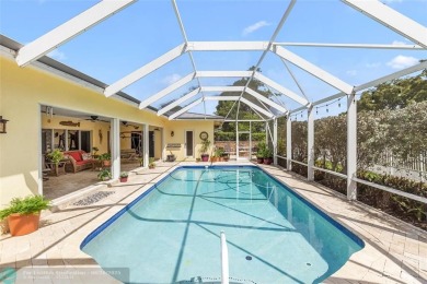 Unique Key West-style waterfront retreat in prestigious Golf on Plantation Preserve Golf Course in Florida - for sale on GolfHomes.com, golf home, golf lot
