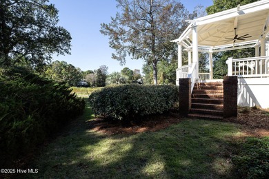 This beautifully renovated home sits along the Ocean #5 fairway on Country Club of Landfall in North Carolina - for sale on GolfHomes.com, golf home, golf lot