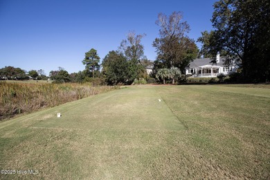This beautifully renovated home sits along the Ocean #5 fairway on Country Club of Landfall in North Carolina - for sale on GolfHomes.com, golf home, golf lot