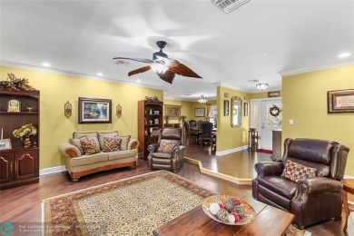 Unique Key West-style waterfront retreat in prestigious Golf on Plantation Preserve Golf Course in Florida - for sale on GolfHomes.com, golf home, golf lot