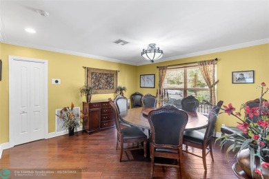 Unique Key West-style waterfront retreat in prestigious Golf on Plantation Preserve Golf Course in Florida - for sale on GolfHomes.com, golf home, golf lot