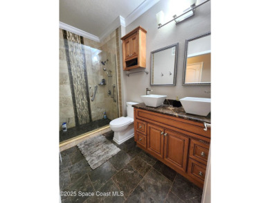 First Floor Updated Property that includes a GARAGE.  Gorgeous on Indian River Colony Club in Florida - for sale on GolfHomes.com, golf home, golf lot