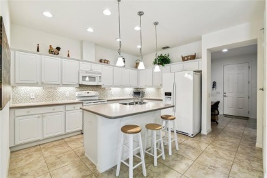Enjoy gorgeous and relaxing WATER VIEWS from this beautifully on Stonegate Golf Club in Florida - for sale on GolfHomes.com, golf home, golf lot