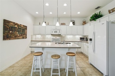 Enjoy gorgeous and relaxing WATER VIEWS from this beautifully on Stonegate Golf Club in Florida - for sale on GolfHomes.com, golf home, golf lot