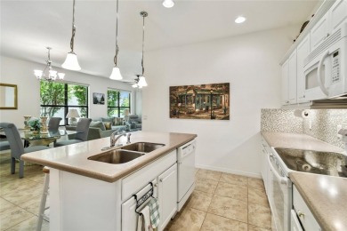 Enjoy gorgeous and relaxing WATER VIEWS from this beautifully on Stonegate Golf Club in Florida - for sale on GolfHomes.com, golf home, golf lot