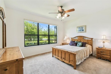 Enjoy gorgeous and relaxing WATER VIEWS from this beautifully on Stonegate Golf Club in Florida - for sale on GolfHomes.com, golf home, golf lot