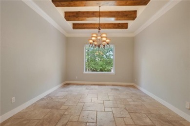 Nestled on a spacious 0.58-acre lot near the Traditions Club on The Traditions Club At Texas A and M in Texas - for sale on GolfHomes.com, golf home, golf lot