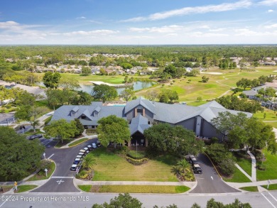 Luxury Estate Home Overlooking Golf Course and Ponds.  This on Heritage Pines Country Club in Florida - for sale on GolfHomes.com, golf home, golf lot