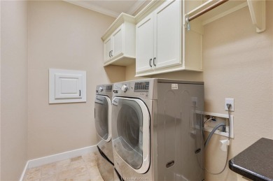 Nestled on a spacious 0.58-acre lot near the Traditions Club on The Traditions Club At Texas A and M in Texas - for sale on GolfHomes.com, golf home, golf lot