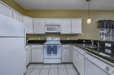 1st-floor end unit, 2-bedroom 2-bathroom cozy condo with on Palmetto Greens Golf and Country Club in South Carolina - for sale on GolfHomes.com, golf home, golf lot