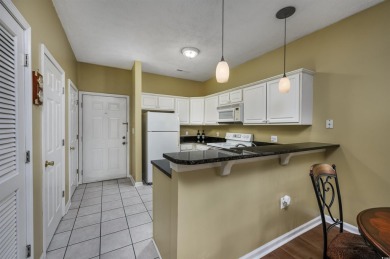 1st-floor end unit, 2-bedroom 2-bathroom cozy condo with on Palmetto Greens Golf and Country Club in South Carolina - for sale on GolfHomes.com, golf home, golf lot