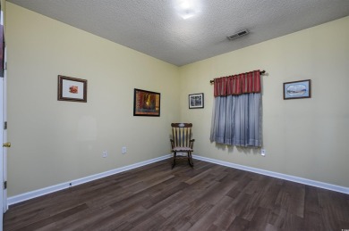 1st-floor end unit, 2-bedroom 2-bathroom cozy condo with on Palmetto Greens Golf and Country Club in South Carolina - for sale on GolfHomes.com, golf home, golf lot