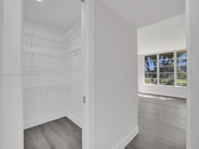 Discover luxurious living in this fully renovated 3-bedroom on Palm-Aire Country Club and Resort - The Oaks in Florida - for sale on GolfHomes.com, golf home, golf lot