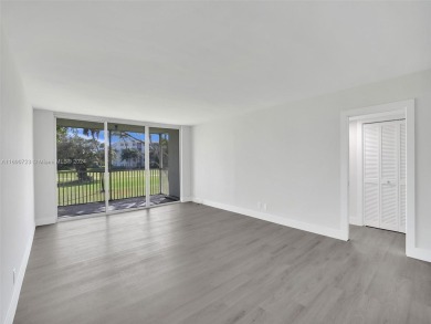 Discover luxurious living in this fully renovated 3-bedroom on Palm-Aire Country Club and Resort - The Oaks in Florida - for sale on GolfHomes.com, golf home, golf lot
