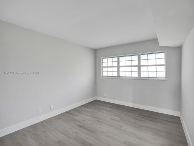 Discover luxurious living in this fully renovated 3-bedroom on Palm-Aire Country Club and Resort - The Oaks in Florida - for sale on GolfHomes.com, golf home, golf lot