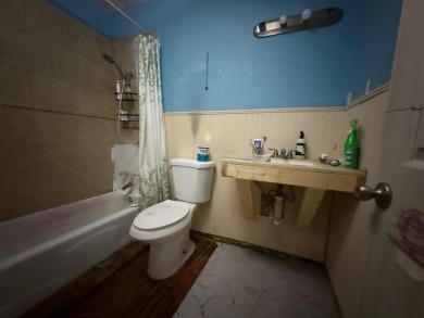 This 3-bedroom, 2-bath home sits on a large corner lot and on Cherokee Village North Course in Arkansas - for sale on GolfHomes.com, golf home, golf lot