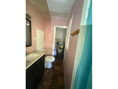 This 3-bedroom, 2-bath home sits on a large corner lot and on Cherokee Village North Course in Arkansas - for sale on GolfHomes.com, golf home, golf lot