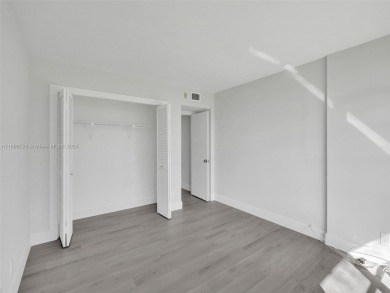 Discover luxurious living in this fully renovated 3-bedroom on Palm-Aire Country Club and Resort - The Oaks in Florida - for sale on GolfHomes.com, golf home, golf lot