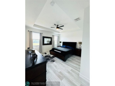 Priced to SELL! Just MOVE IN! Luxury FULLY UPGRADED 2,131SQq Ft on Boca Dunes Golf and Country Club in Florida - for sale on GolfHomes.com, golf home, golf lot