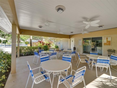 Discover luxurious living in this fully renovated 3-bedroom on Palm-Aire Country Club and Resort - The Oaks in Florida - for sale on GolfHomes.com, golf home, golf lot