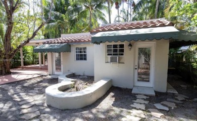 Step into timeless elegance in this classic Miami Beach home on Miami Beach Golf Club in Florida - for sale on GolfHomes.com, golf home, golf lot