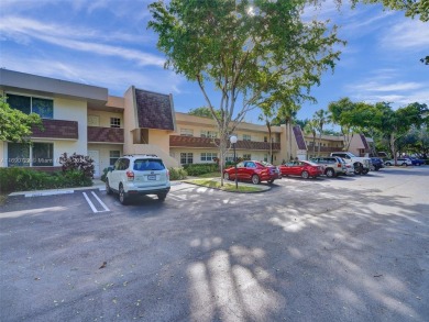 Discover luxurious living in this fully renovated 3-bedroom on Palm-Aire Country Club and Resort - The Oaks in Florida - for sale on GolfHomes.com, golf home, golf lot