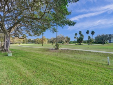 Discover luxurious living in this fully renovated 3-bedroom on Palm-Aire Country Club and Resort - The Oaks in Florida - for sale on GolfHomes.com, golf home, golf lot