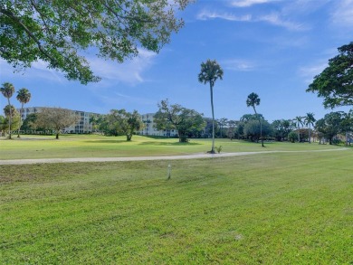 Discover luxurious living in this fully renovated 3-bedroom on Palm-Aire Country Club and Resort - The Oaks in Florida - for sale on GolfHomes.com, golf home, golf lot