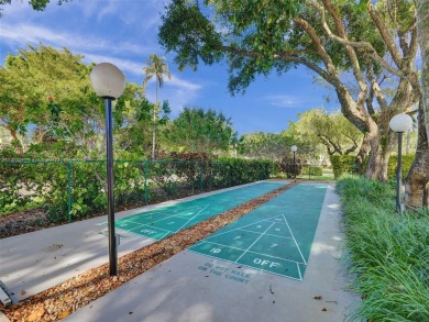 Discover luxurious living in this fully renovated 3-bedroom on Palm-Aire Country Club and Resort - The Oaks in Florida - for sale on GolfHomes.com, golf home, golf lot