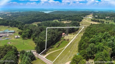 Nestled on 5 peaceful, wooded acres, this charming 2-bedroom on Wind River Golf Course in Tennessee - for sale on GolfHomes.com, golf home, golf lot