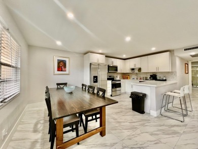 WELCOME HOME TO YOUR 2/2 TURNKEY, COMPLETELY RENOVATED on Wynmoor Golf Course in Florida - for sale on GolfHomes.com, golf home, golf lot