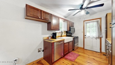 Nestled on 5 peaceful, wooded acres, this charming 2-bedroom on Wind River Golf Course in Tennessee - for sale on GolfHomes.com, golf home, golf lot