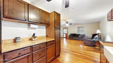 Nestled on 5 peaceful, wooded acres, this charming 2-bedroom on Wind River Golf Course in Tennessee - for sale on GolfHomes.com, golf home, golf lot