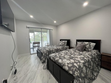 WELCOME HOME TO YOUR 2/2 TURNKEY, COMPLETELY RENOVATED on Wynmoor Golf Course in Florida - for sale on GolfHomes.com, golf home, golf lot