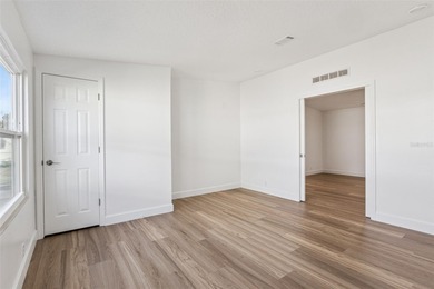 One or more photo(s) has been virtually staged. Move in Ready on Bay Tree Golf Course in Florida - for sale on GolfHomes.com, golf home, golf lot