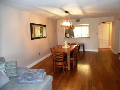 Lovely condo in prestigious Meadowood Country Club overlooking on Meadowood Golf and Tennis Club in Florida - for sale on GolfHomes.com, golf home, golf lot