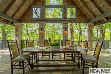 Situated on a large lot, prominently overlooking the 10th golf on Wade Hampton Golf Club in North Carolina - for sale on GolfHomes.com, golf home, golf lot