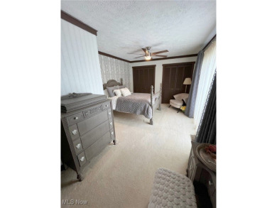 Welcome to 411 E. Mohawk Dr., Malvern. Nestled in the private on Lake Mohawk Golf Club in Ohio - for sale on GolfHomes.com, golf home, golf lot