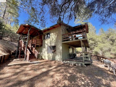 This cabin in the pines called 'Lil Oak Hill' is beautifully on Pine Mountain Lake Country Club in California - for sale on GolfHomes.com, golf home, golf lot