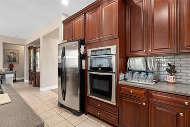 Welcome to luxury living in the highly sought-after, gated Eagle on Eagle Creek Golf Club in Florida - for sale on GolfHomes.com, golf home, golf lot