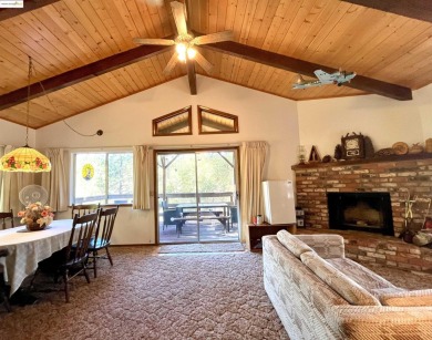This cabin in the pines called 'Lil Oak Hill' is beautifully on Pine Mountain Lake Country Club in California - for sale on GolfHomes.com, golf home, golf lot
