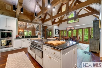 Situated on a large lot, prominently overlooking the 10th golf on Wade Hampton Golf Club in North Carolina - for sale on GolfHomes.com, golf home, golf lot