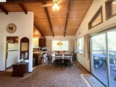 This cabin in the pines called 'Lil Oak Hill' is beautifully on Pine Mountain Lake Country Club in California - for sale on GolfHomes.com, golf home, golf lot