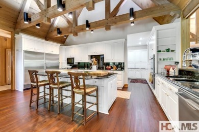 Situated on a large lot, prominently overlooking the 10th golf on Wade Hampton Golf Club in North Carolina - for sale on GolfHomes.com, golf home, golf lot