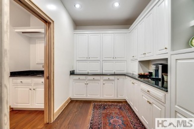 Situated on a large lot, prominently overlooking the 10th golf on Wade Hampton Golf Club in North Carolina - for sale on GolfHomes.com, golf home, golf lot