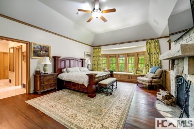 Situated on a large lot, prominently overlooking the 10th golf on Wade Hampton Golf Club in North Carolina - for sale on GolfHomes.com, golf home, golf lot